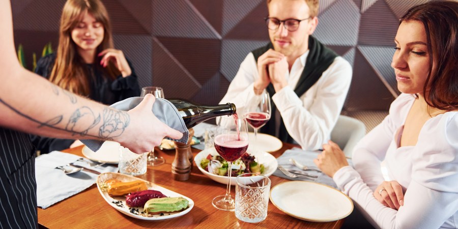 People have a dinner in restaurant.